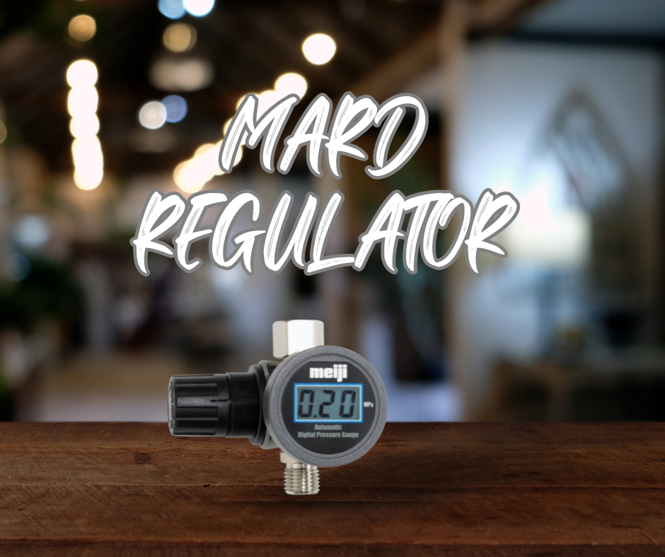 Meiji Digital Air Regulator attached to spray gun – compact digital gauge for precise air pressure control.