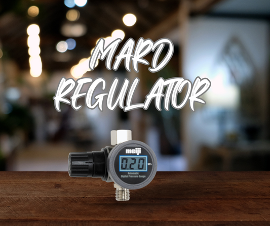 Meiji Digital Air Regulator attached to spray gun – compact digital gauge for precise air pressure control.